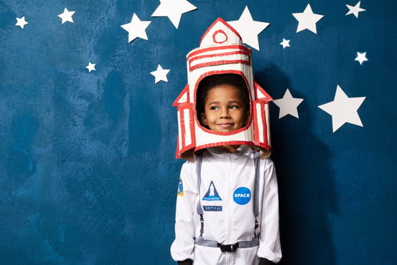 boy dressed up in homemade astronaut suit
